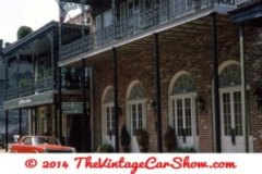 a-red-car-parked-at-place-d-armes-motel-french-quarter-no-l