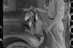 1_filling-radiator-of-migrant-car-with-water